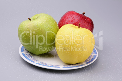 Three multi-coloured apples