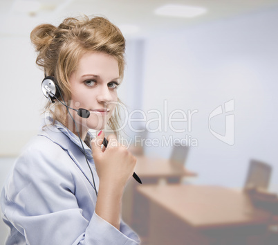 Woman wearing headset indoors