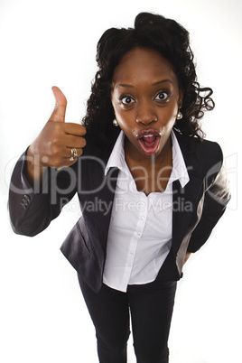 A pretty african american business woman with thumbs up