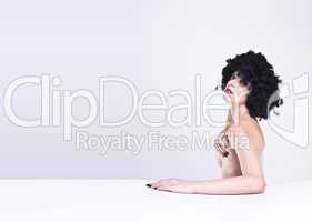 sexy young topless woman with afro hair style