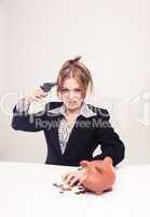 Attractive young businesswoman with gun, weapon