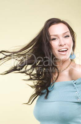 an elegant young woman smiling