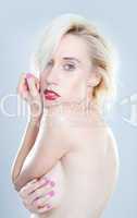 young Beautiful blonde woman topless