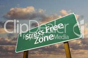Stress Free Zone Green Road Sign and Clouds