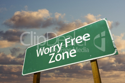 Worry Free Zone Green Road Sign and Clouds