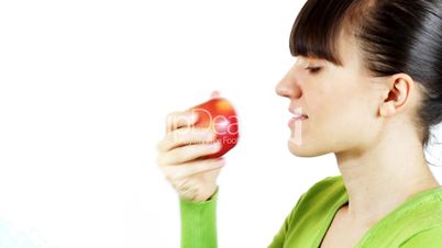 Young woman eating an apple