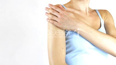 Woman gently touching the skin