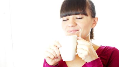 Portrait of girl drinking tea