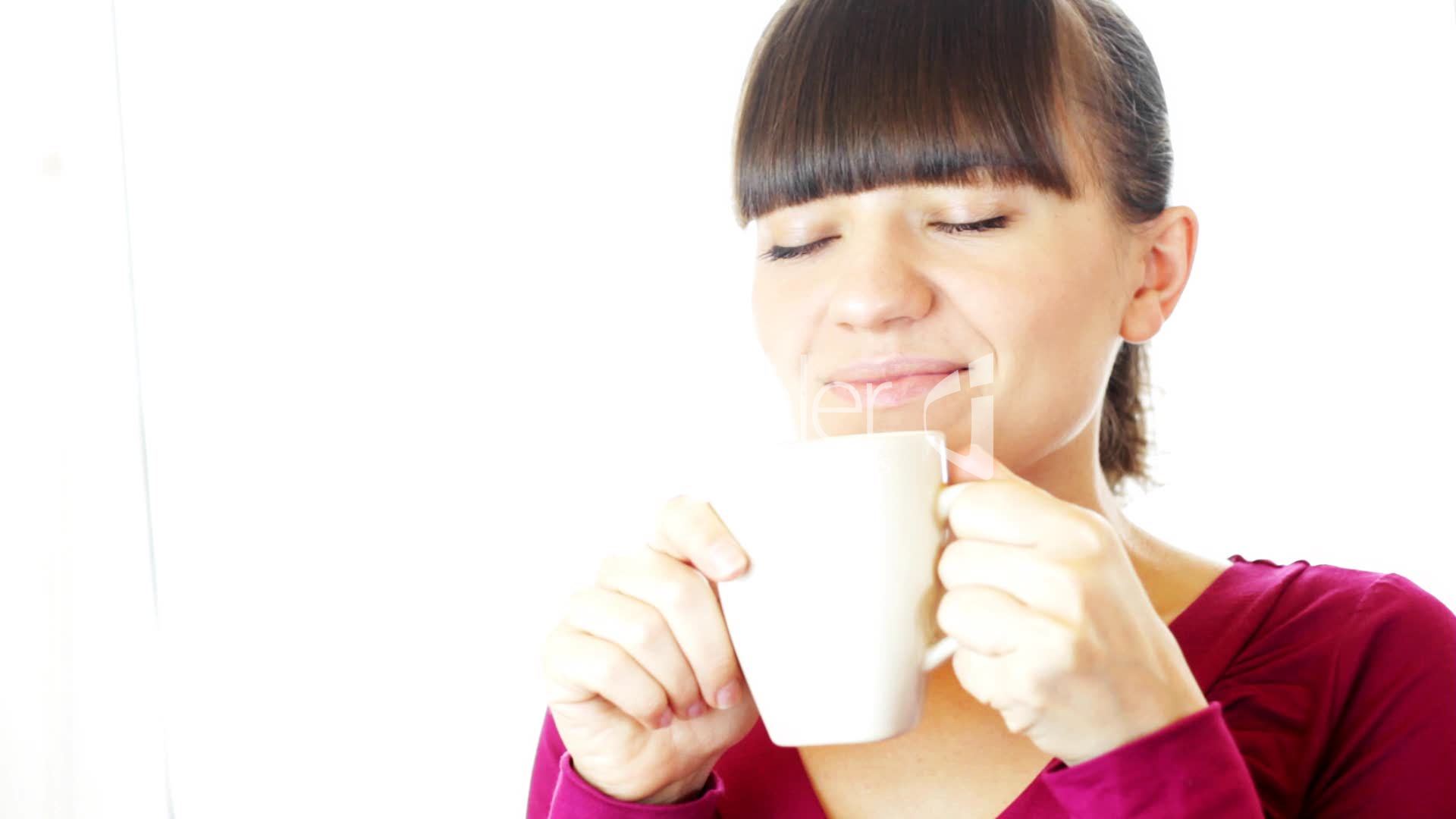 Portrait of girl drinking tea: Lizenzfreie Stock Videos und Clips