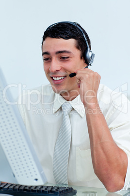 Young businessman using headset