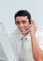 Assertive businessman using headset