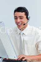 Cheerful businessman using headset