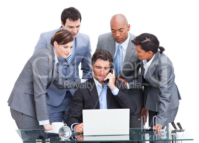 Assertive manager on phone and his team