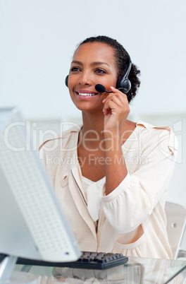 Positive businesswoman with headset on
