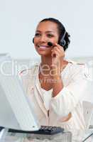 Positive businesswoman with headset on