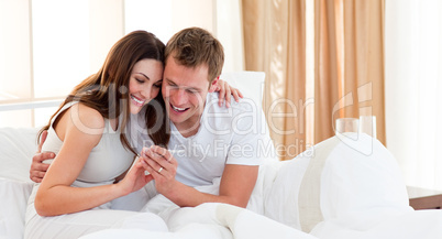 Affectionate couple finding out results of a pregnancy test