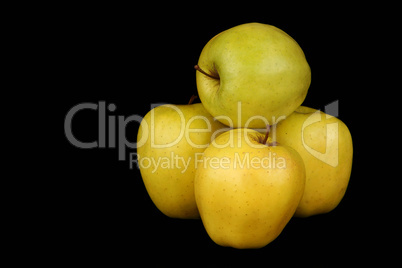 Four yellow apples