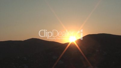 Sunset timelapse over mountains