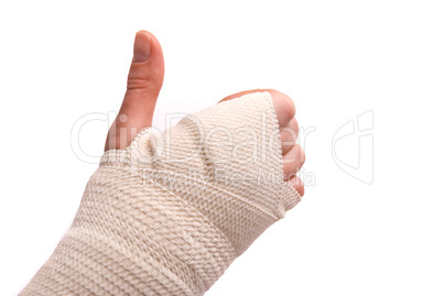 White medicine bandage on human injury hand. Studio isolated.