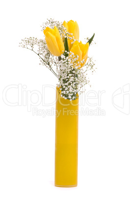 Bouquet from yellow tulips in a vase on a white background.