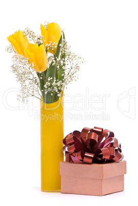 Bouquet from yellow tulips and gift box