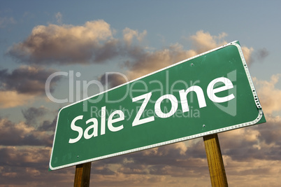 Sale Zone Green Road Sign and Clouds