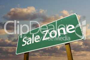Sale Zone Green Road Sign and Clouds