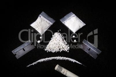 Composition of Cocaine, razor and rolled bill,  Making Sad Face