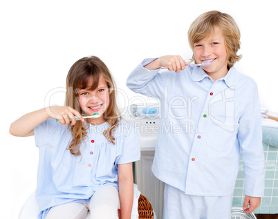 Cute children brushing their teeth