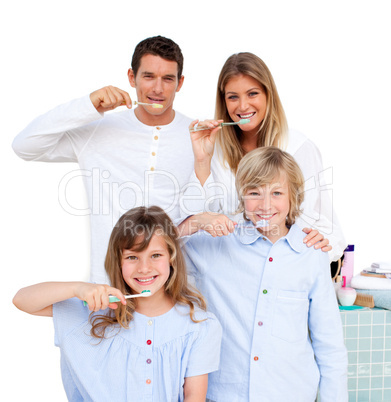 Merry family brushing their teeth
