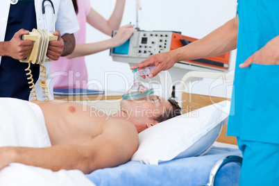 Medical team resuscitating a patient