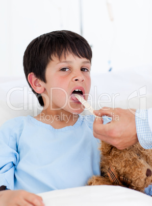 Adorable little boy attending medical exam