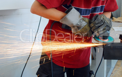 worker with grinder