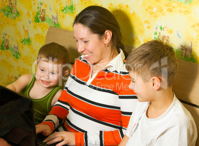 Family with a laptop