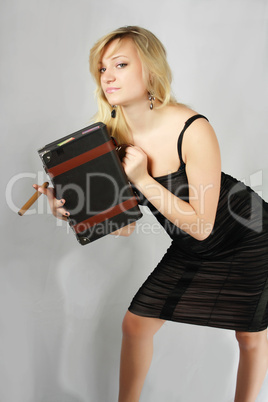 blonde with cigar and valise