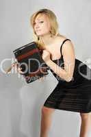 blonde with cigar and valise
