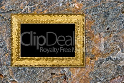 Stone background with vintage gold frame