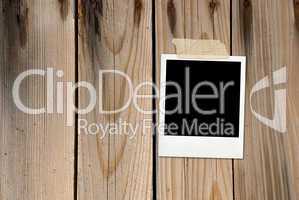 Grunge wood background with photo card