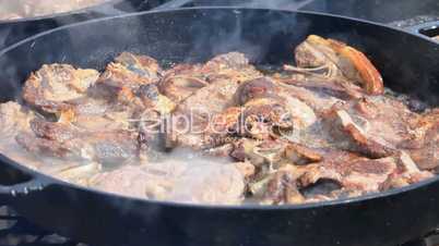 Lamb chops cooking with smoke