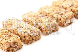Row of Several Granola Bars Isolated on White