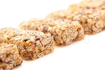 Row of Several Granola Bars Isolated on White