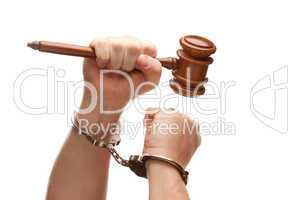 Handcuffed Man Holding Wooden Gavel on White