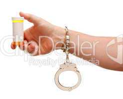 Handcuffed Man Holding Blank Medicine Bottle Isolated on White