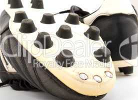 old black cleats