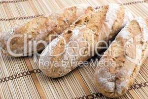 three fresh bread baguettes