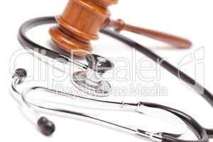 Black Stethoscope and Gavel on White