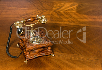 Old-fashioned telephone on table