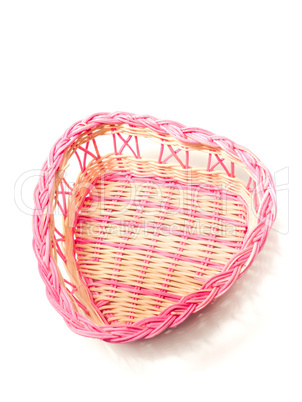 Pink woven basket for gifts on white