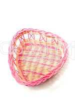 Pink woven basket for gifts on white