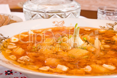 Plate with Borsch and jigger of vodka